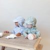 Protective Swim Onesies and Legionnaire Hats - Image 3